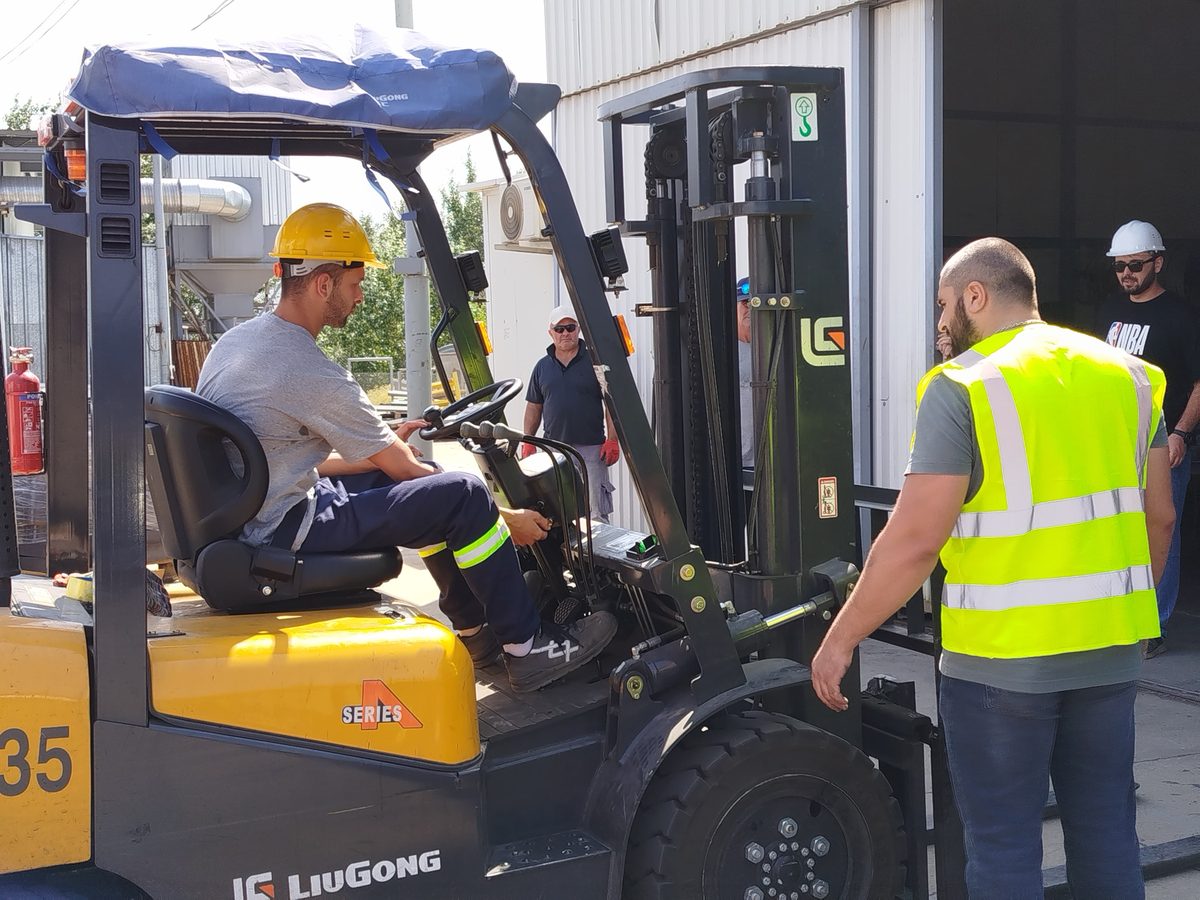 Concept of Safety trainees during hands-on forklift safety instruction